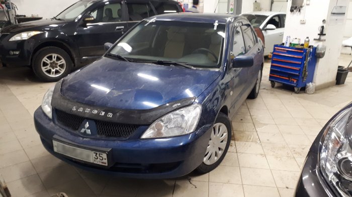 Установили лобовое на Mitsubishi Lancer 9